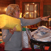 Judy demonstrates the true spirit of the Yankee Swap: 'I'm swapping this for what YOU got!'
